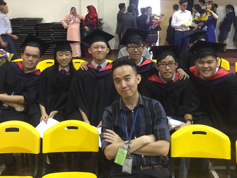 Mr Soon with students at their graduation ceremony